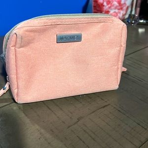 Pink travel size makeup bag from Amazon